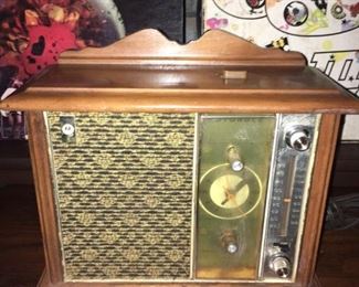 AM/FM Radio with clock between 1970's - 1990's.