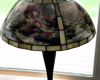 Thomas Kinkade scenes on stained glass lamp                          