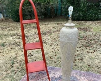 Vintage red MCM bamboo stand $85
Banana leaf floor light stone $150
