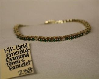 14k Gold, Emerald and Diamond tennis bracelet 