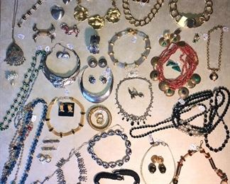 A sneak-peak at just a smidgen of all the Costume Jewelry for sale. Lots of fine Sterling and designer pieces. ALL priced to sell. Most from the 1970s-1990s.