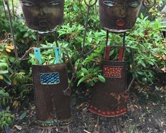 Fun pair on stand up planters.