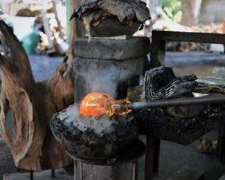 Hand blown molten or melted glass