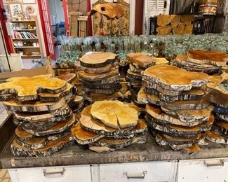 Teak slices for cutting boards, display stands, or wall decor at 70% off.