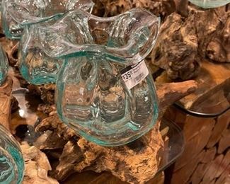 Fluted hand blown molten glass over a driftwood teak bases. While they last at 70% off!