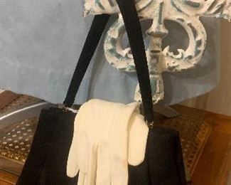 Every lady needs her purse and gloves. More purses and gloves to choose from too.