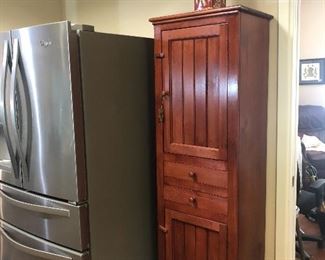 wood cabinet- great extra work or pantry space that looks nice too !!