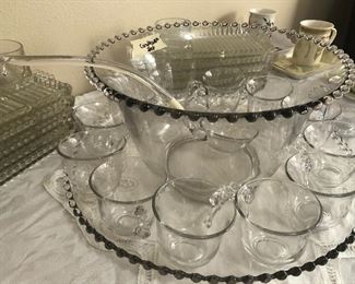 fabulous candlewick punch bowl set- glass ladle - all the cups-  even have a set of candlwwick snack trays w/ square bottom cups-  and a cream and sugar w/ tray - its still beautiful- even though lots of folks aren't as into glass -i love this  