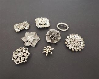 8 silver tone floral brooches