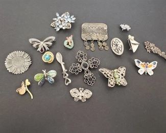 17 brooches