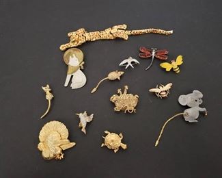 13 animal themed brooches
