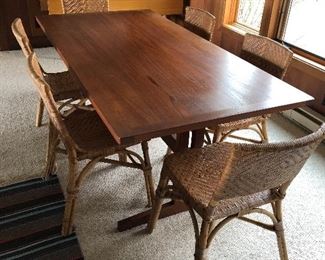 Gorgeous 1950s trestle table and rattan chairs. Two additional leaves. 