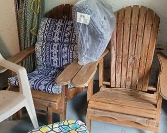 2 Wooden Adirondack Chairs w/cushions and slide out attached Ottomans