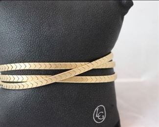 18K YG THREE STRAND INTERTWINED FLEX LINK BRACELET WITH SAFETY LATCH