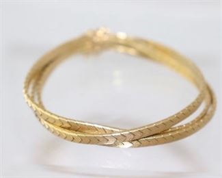 18K YG THREE STRAND INTERTWINED FLEX LINK BRACELET WITH SAFETY LATCH