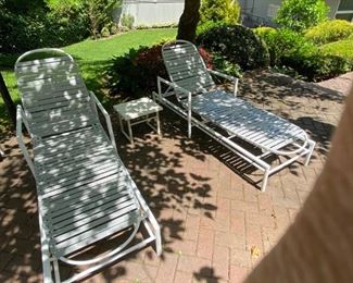 Pair Of Brown Jordan Chaise Lounges With Light Gray Straps