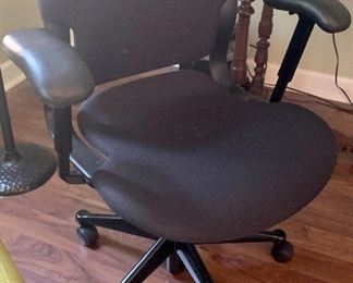 Upholstered armed arm chair on casters with 2 adjustment arms $39