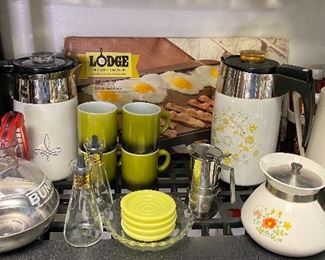 NIB large cast iron griddle, Corning ware Coffee pots, Modern To e coasters, and great vi rage coffee items