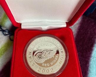Red wings coin 