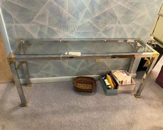 #8	chrome and brass glass top sofa table 55x15x25	 $65.00 
