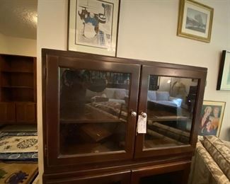 #18	(2) glass front display cabinets with 1 wood shelf 42x13x27 $125 ea.	 $250.00 
