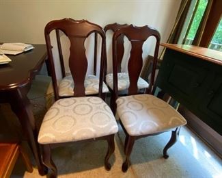 #21	4 odd dining chairs by Coaster company with cream seats 	 $100.00 

