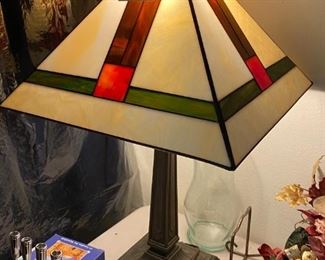 #34	stained glass Stickley look brass base  lamp 22 tall with cream/pink and green shade 	 $125.00 
