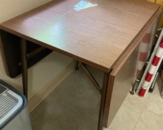 #37	vintage drop side laminate tables  with chrome legs 21-47x30x29	 $65.00 

