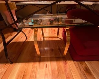 #42	brass base glass top end table 26x24x21	 $30.00 
