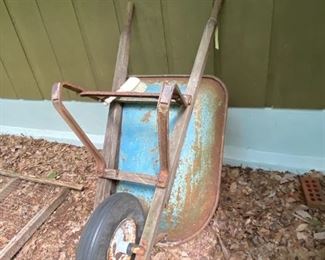 #65	metal wheel barrow blue	 $45.00 
