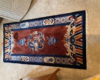 #142	Hand-knotted Silk Rust/Royal Blue/Navy Blue   27x55	 $120.00 
