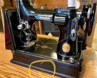 #203  221 K Featherweight Sewing machine w/box & Attachments   $350