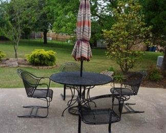 patio table and chairs with umbrella