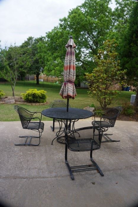 patio table and chairs with umbrella