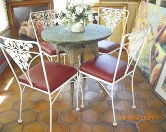Wicker Table; four cast chairs