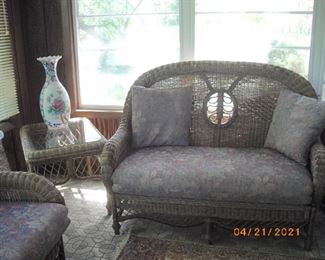wicker love seat and side table