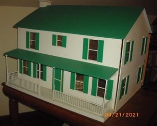 Large dollhouse with lots of furniture