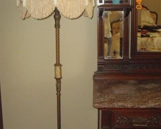 floor lamp with fringed lamp shade