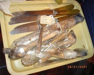 There are four sets of silver plate flatware and some misc. sterling silver pieces.