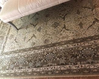 Gray color rug and pull out sleeper sofa