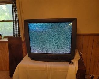 32 Sharp TV with Remote. Located in walkout basement.
