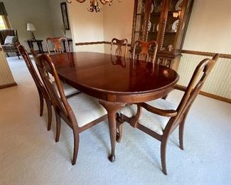 Beautiful dining room table with chairs. 