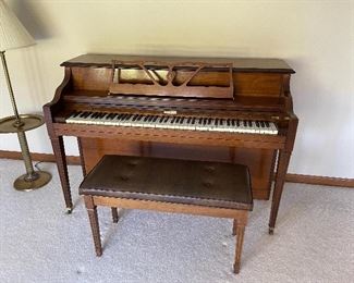 Nice upright piano with bench 