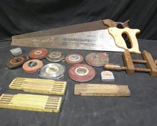 Vintage Hand Saws, Wood Clamp, Folding Rulers
- 2 Hand Saws, One Craftsman, One Disston
- 3 Wood Folding Rulers
- 6 Vintage Metal Tape Measures, 50'
- 2 Vintage Metal Tape Measures 100'
- 2 Vintage Metal Tape Measures, Other