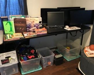 5 Monitors, Children's Books, Dictionaries, Misc Electronic Cords and Accessories under table.