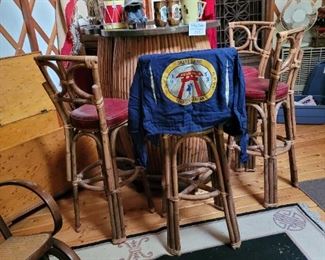 Barrel bamboo bar and chairs. Shelves inside the bar.