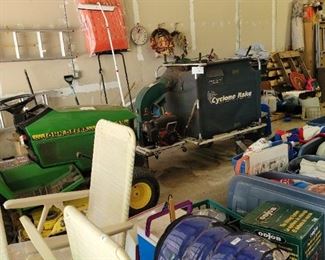 John Deer and also a yard cyclone rake.
