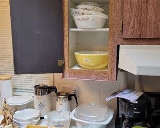 Lots and lots of vintage cook ware and pots and pans.