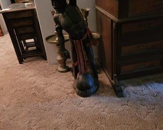 African head hunter wood carving picked up in as client father traveled the globe in service.