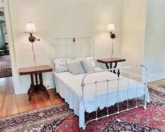 Antique iron and brass bed, two east lake parlor tables 